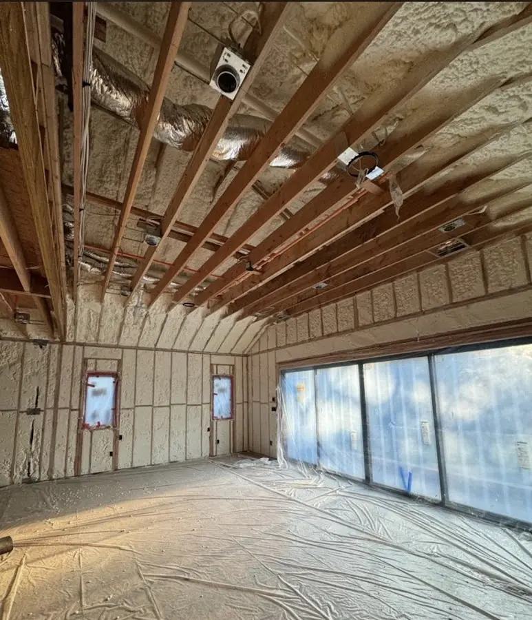 Interior walls and ceiling insulated with spray foam during new construction in Noblesville